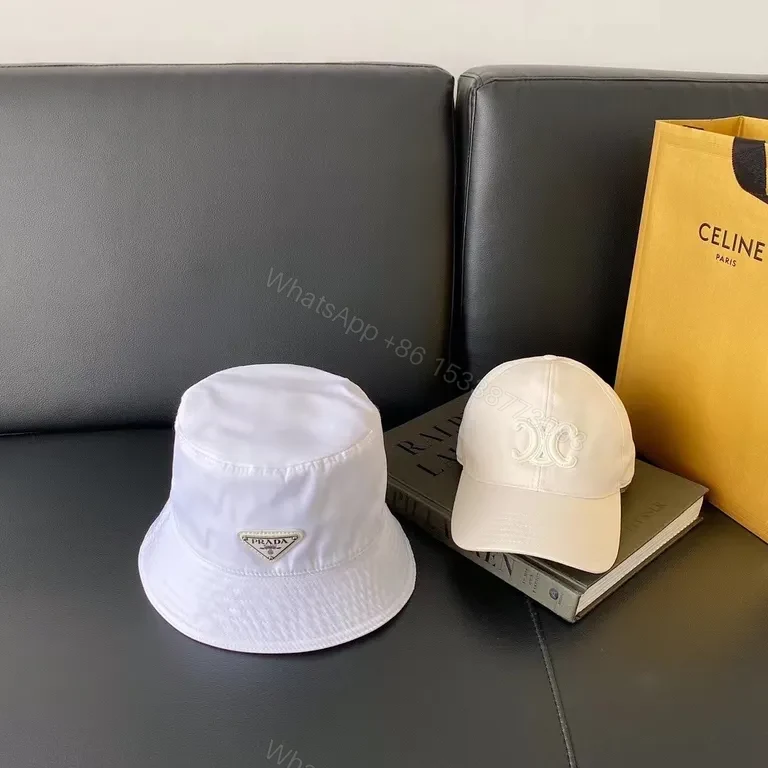 View 3 of Prada White Nylon Bucket Hat â€“ Luxe Minimalist Style