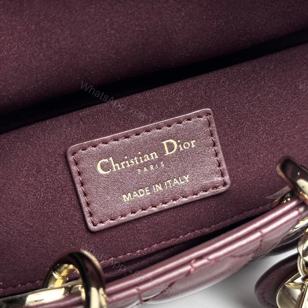 View 8 of Quilted Burgundy Calfskin Top-Handle Bag with Gold Accents
