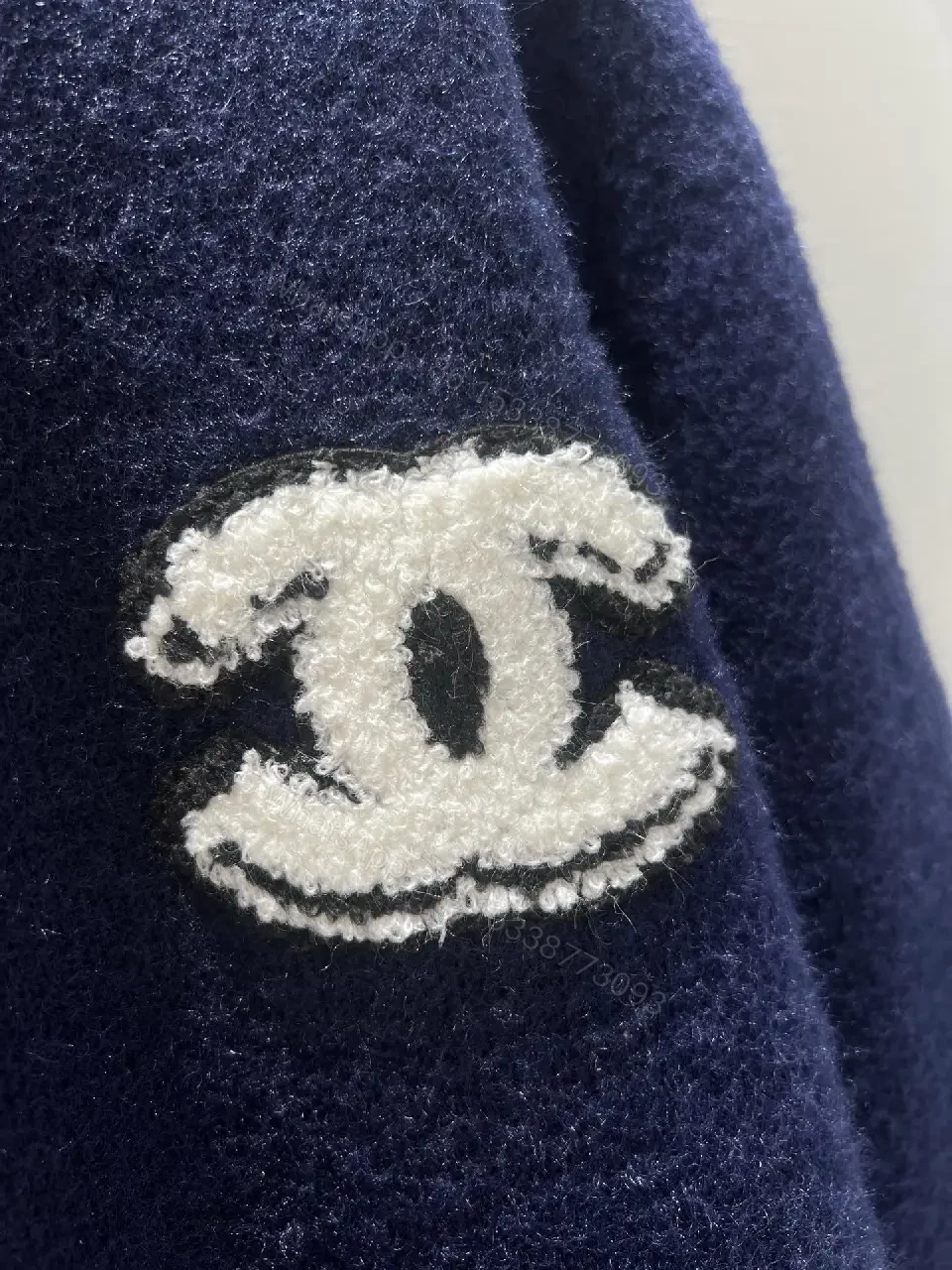 View 2 of Navy Bouclé Knit Cardigan with Logo Detail