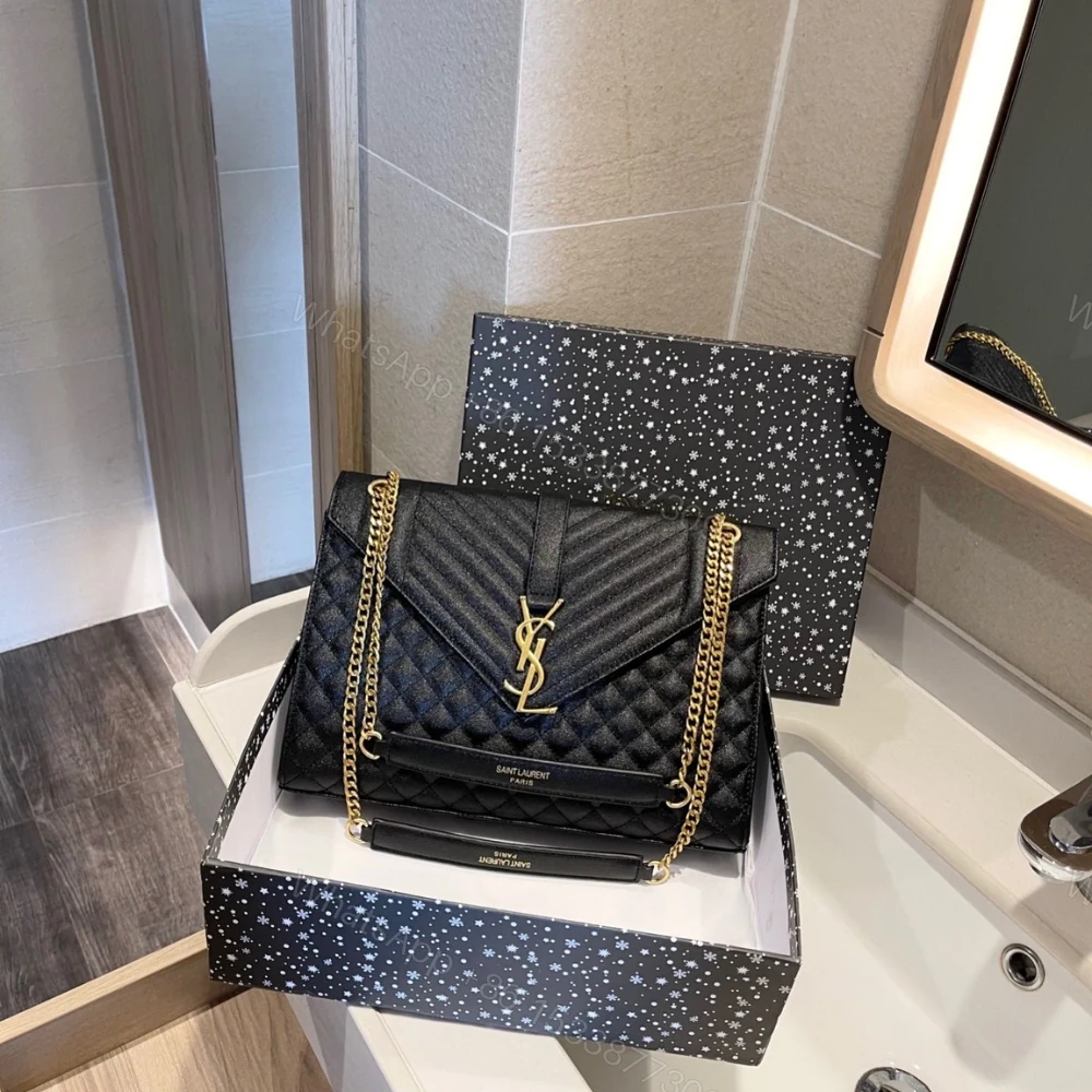 View 3 of Saint Laurent Envelope Large In Quilted Grain De Poudre Embossed Black Gold 31Cm 600166BOW911000