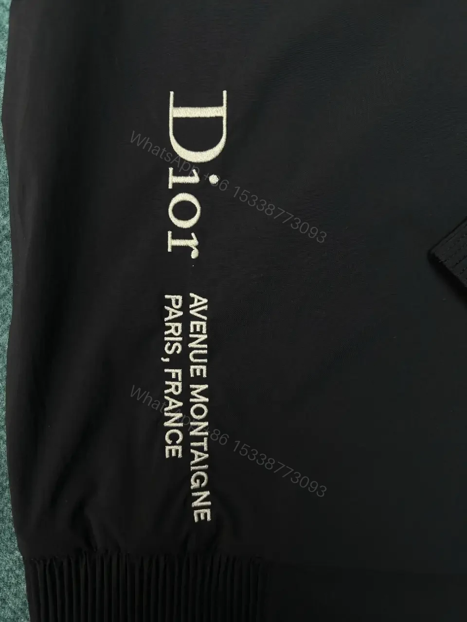 View 5 of Black Shell Bomber Jacket - Minimalist Luxury, Subtle Branding, Lightweight Warmth