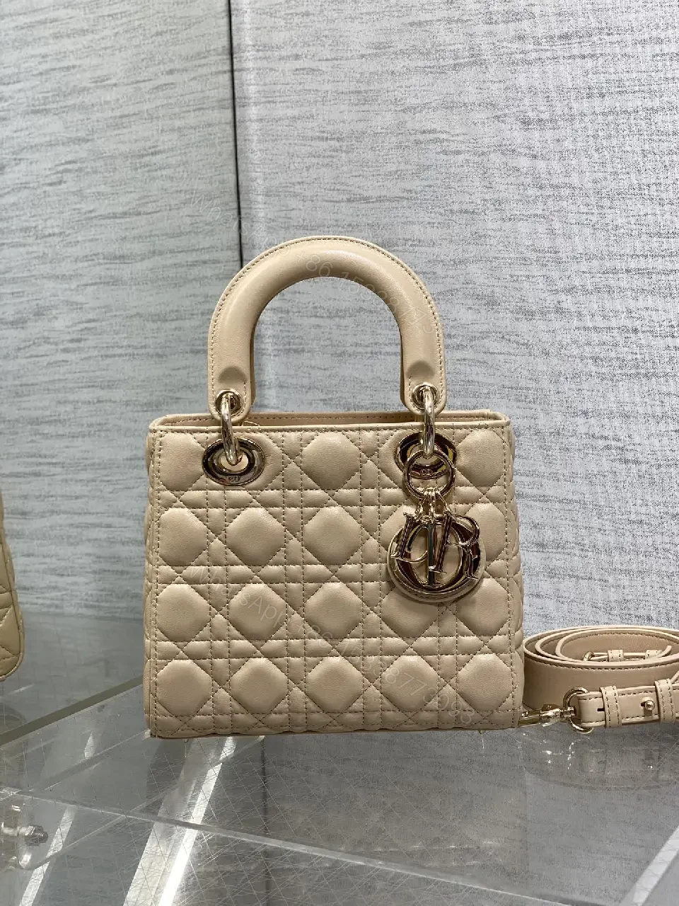 View 9 of Beige Quilted Leather Handbag with Top Handle for Everyday Luxury