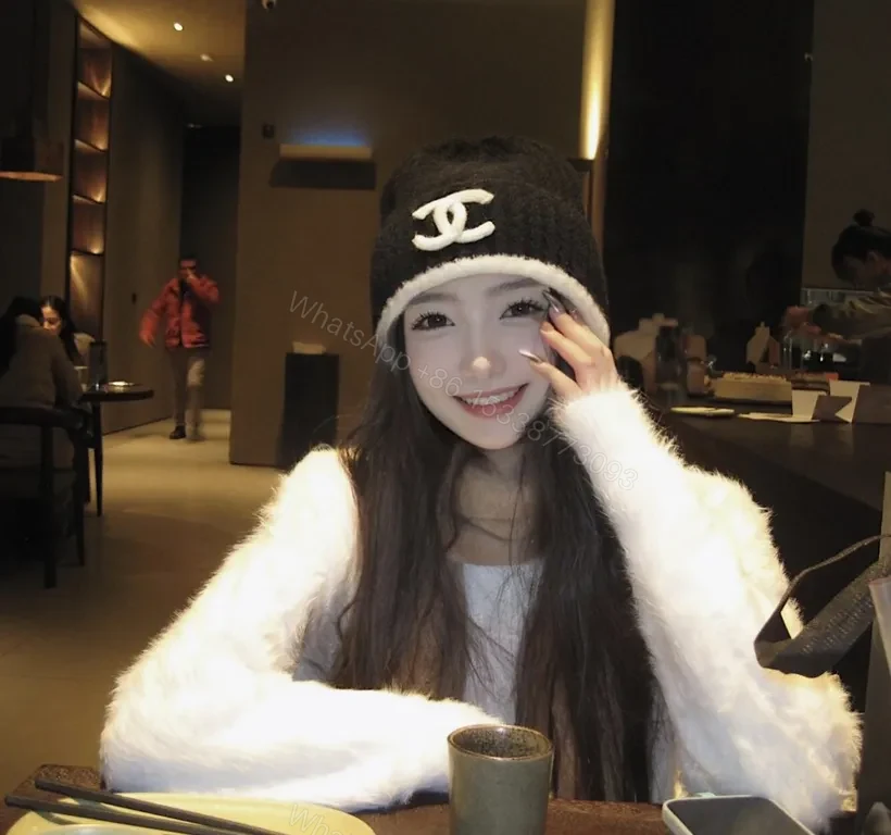 View 3 of Patterned Knit Beanie - Signature Chanel Embroidery Luxury Beanie