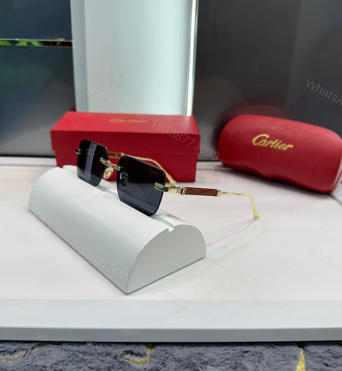 View 2 of Cartier Rimless Sunglasses Gold-Black