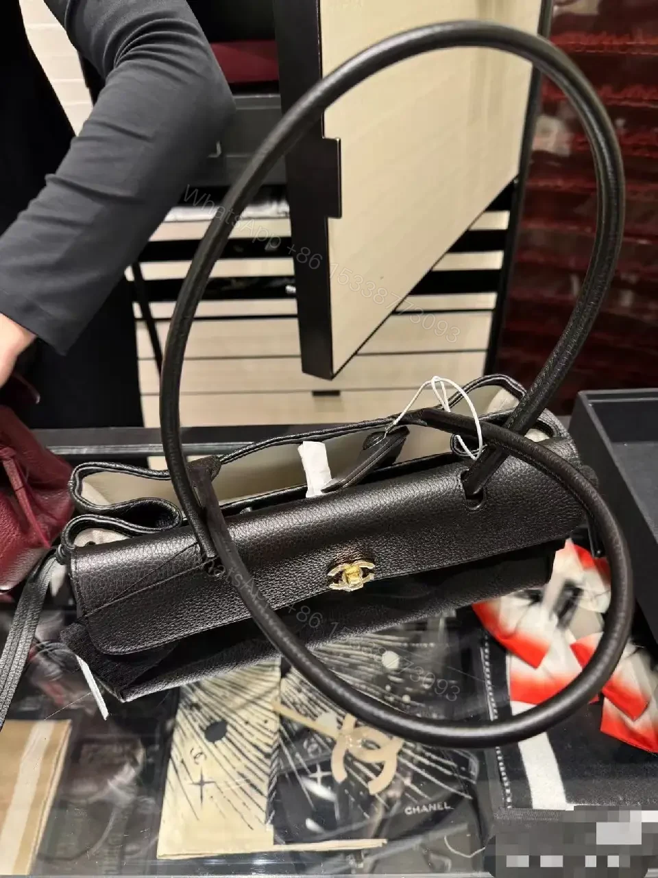 View 7 of Quilted Black Leather Handbag with Gold Hardware Luxury
