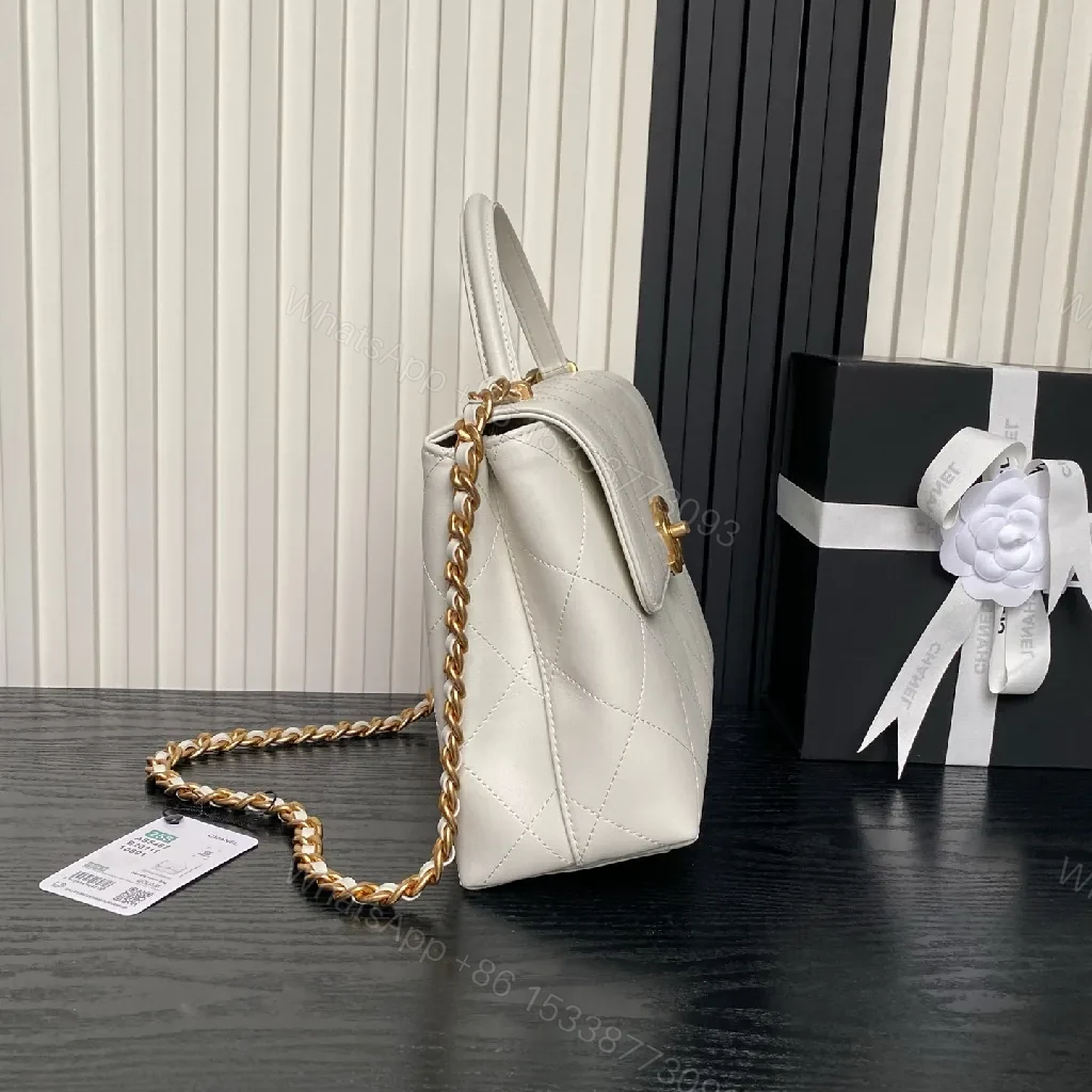 View 5 of White Quilted Mini Leather Bag with Gold Chain – Luxe Compact Style