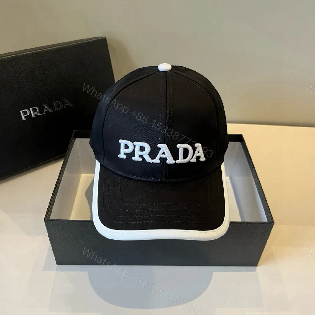 Bold Monochrome Cap with White Accent Cap, Prada-Style Logo — view 1