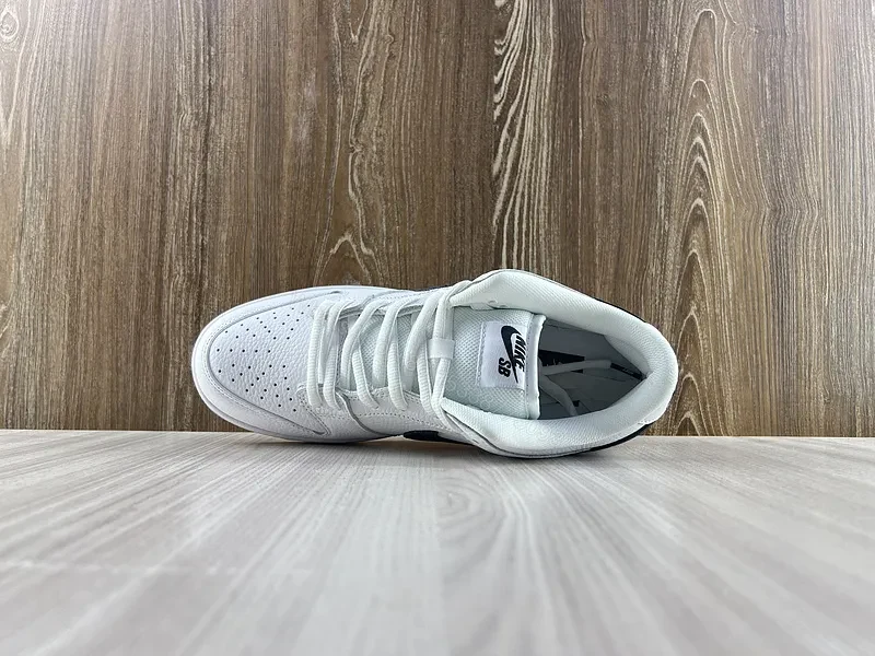 View 9 of Minimal White & Black Nike-Style Sneaker with Gum Sole