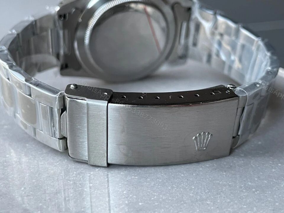 View 9 of VINTAGE Rolex Submariner Date Tiffany & Co 16610A30B9315 Black dial with SS bracelet