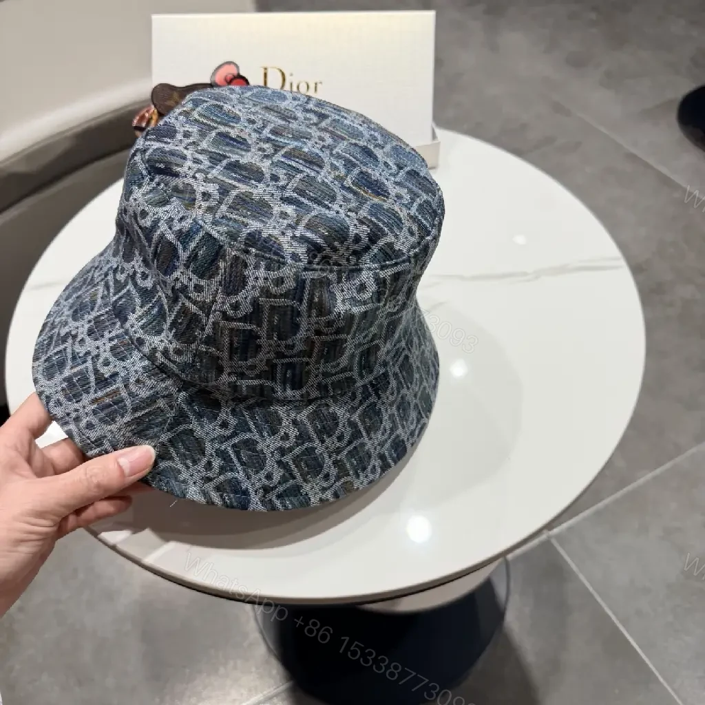 View 3 of Denim-Texture Bucket Hat with Monogram Detail, Luxury Everyday