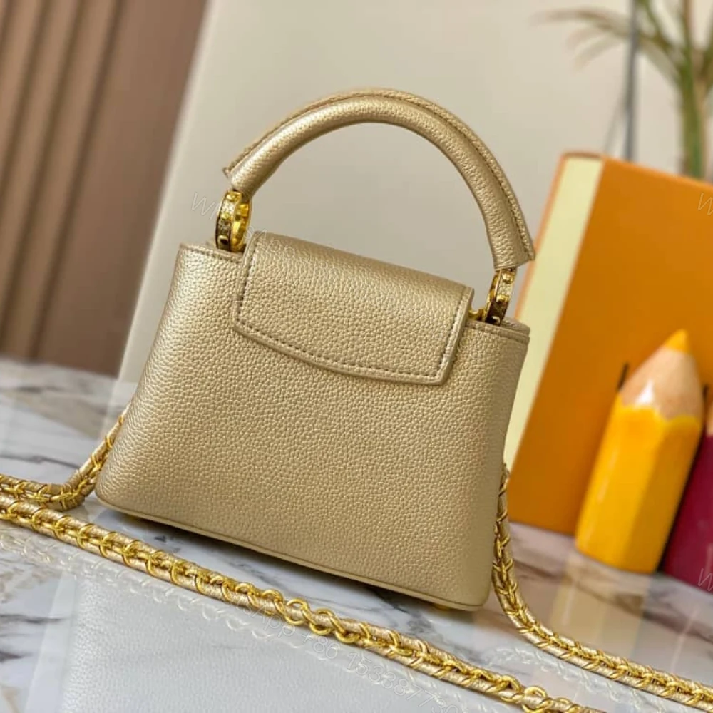 View 3 of Louis Vuitton Capucines Bag Gold 21Cm M24583