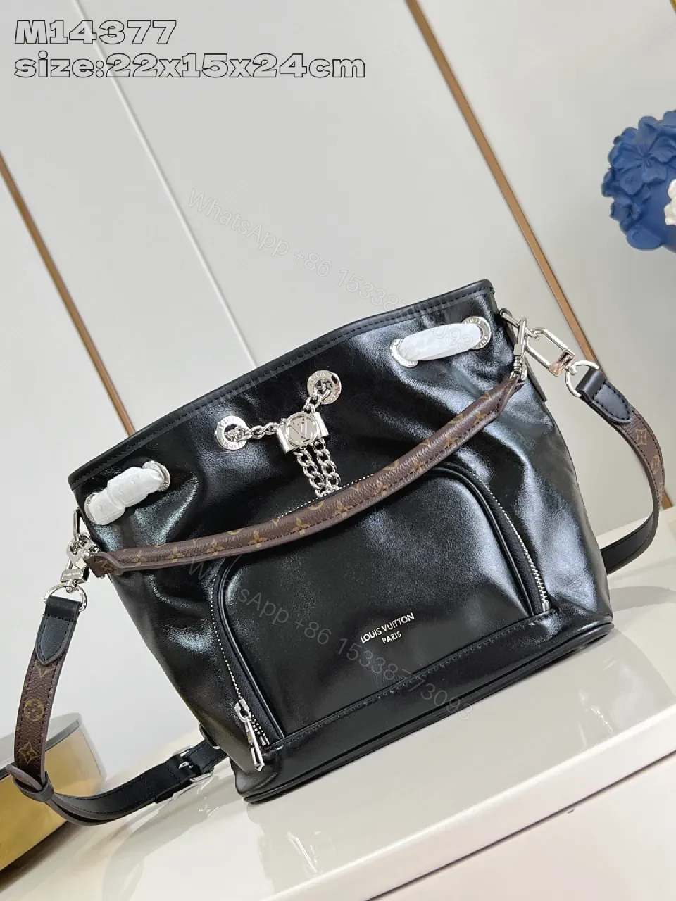 Chic Black Leather Messenger Bag with Signature Hardware — view 1