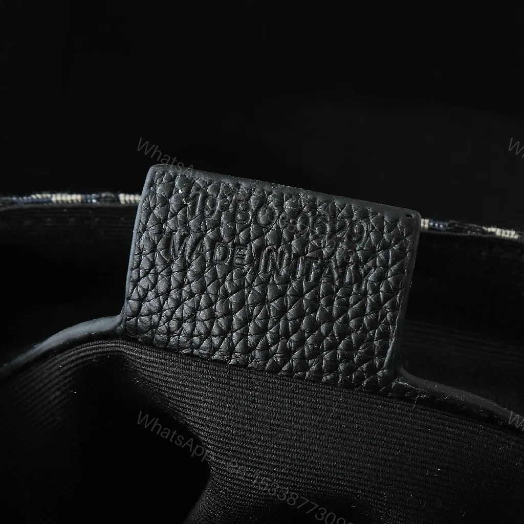 View 5 of Compact Jacquard Sling Bag: Edge-to-Edge Craft, All-Day Versatility