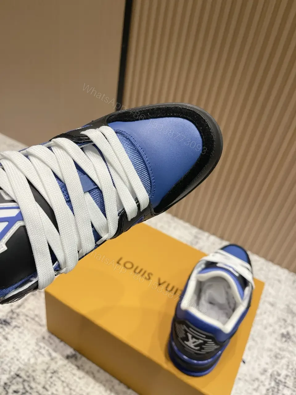 View 8 of Textured Blue-Black Leather High-Tops with Bold Detailing