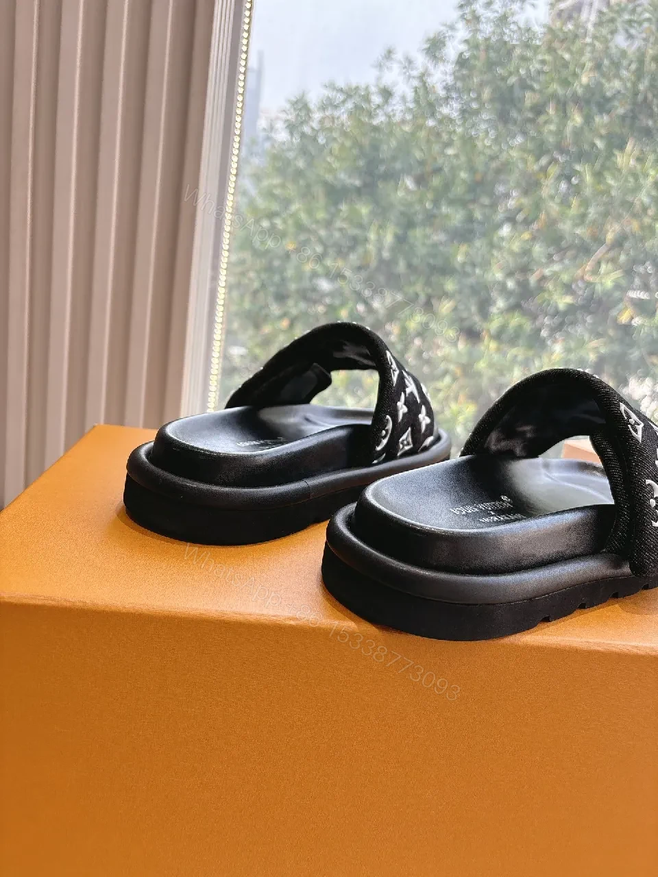 View 4 of Black Monogram Slide with LV Motif — Luxury Comfort Sandal