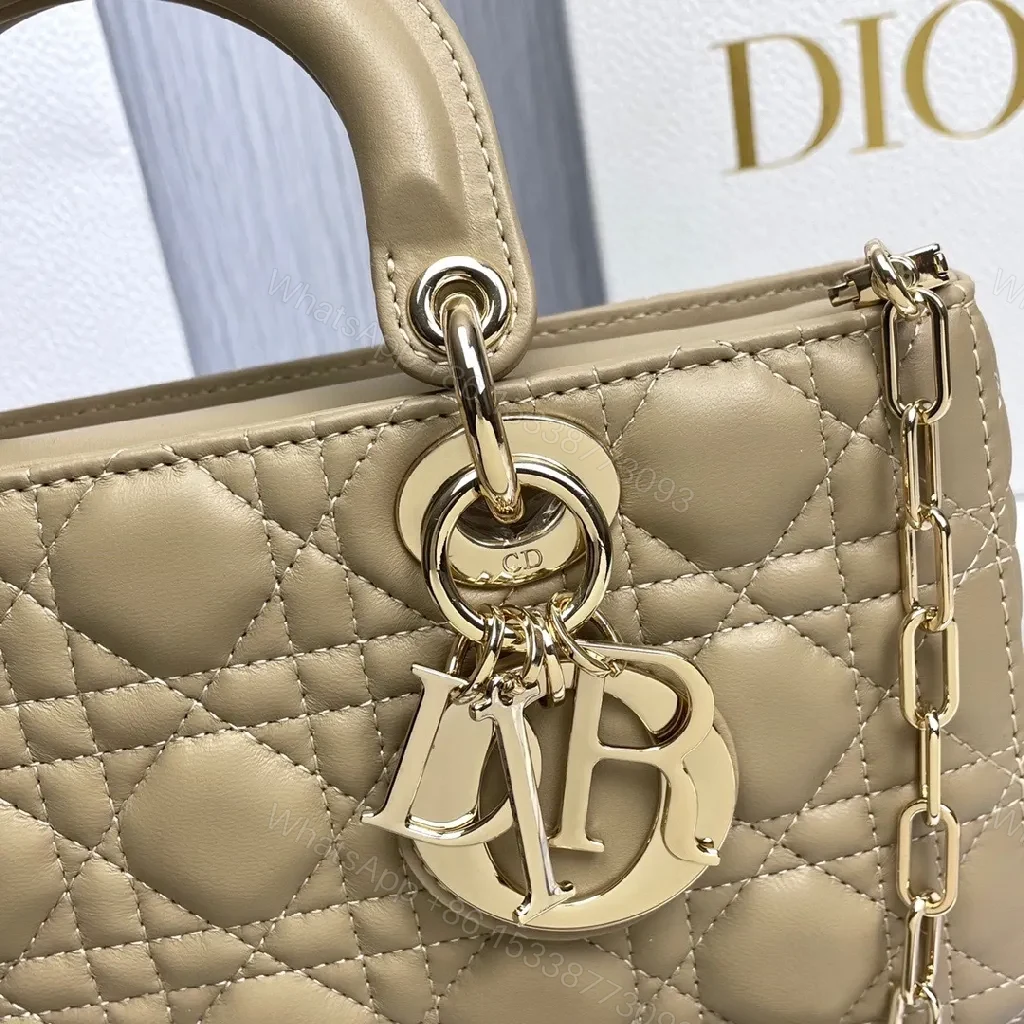 View 5 of Nude Calfskin Quilted Mini Handbag—Top Handle, Dior Hardware