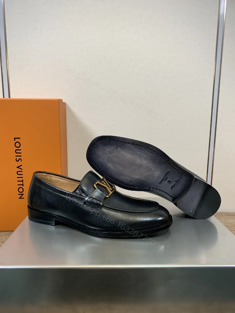 View 3 of Chic Black Leather Penny Loafers with Gold Hardware