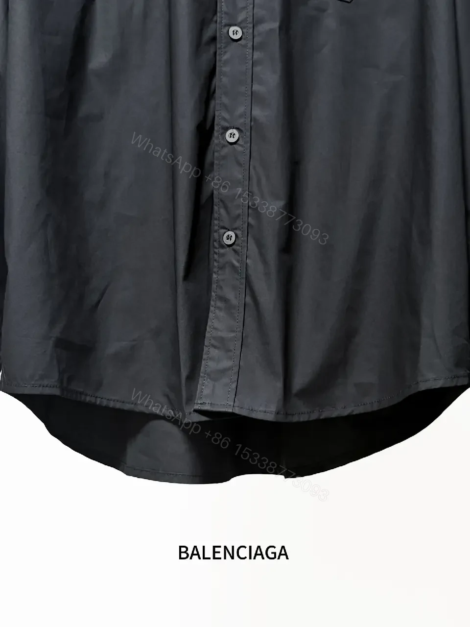 View 9 of Structured Minimalist Button-Front Shirt with Subtle Crest, Black