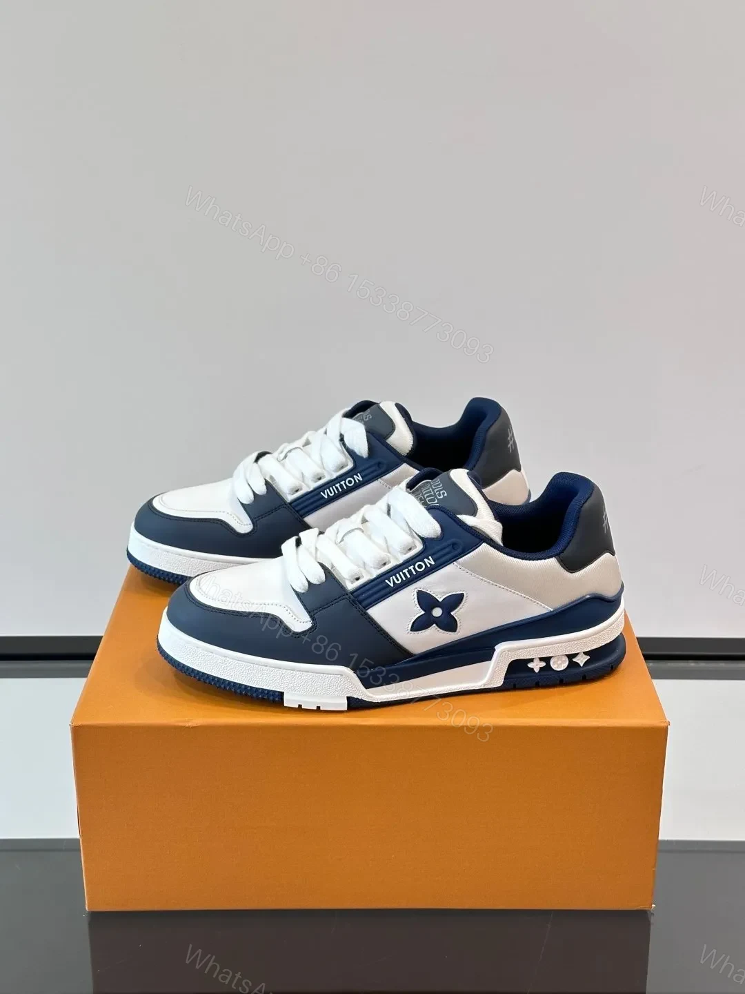 View 3 of LV Men White And Navy Leather Sneakers