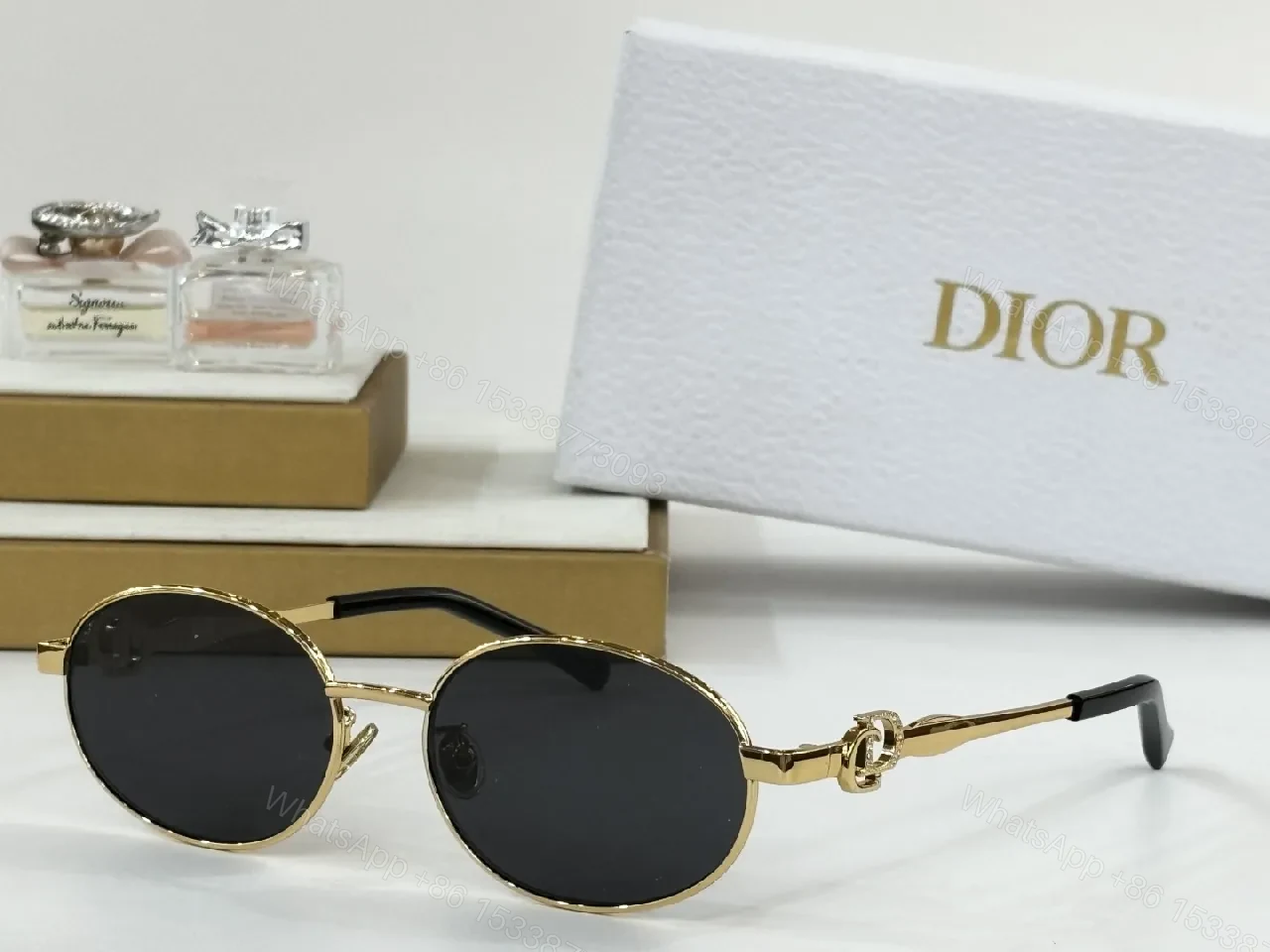 View 2 of Elegant Gold Round Sunglasses with Dior Pattern Monogram