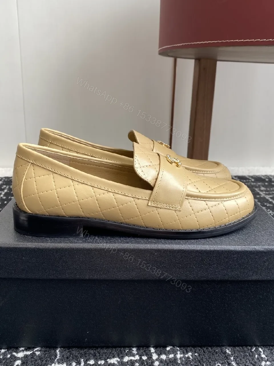 View 8 of Cream Quilted Leather Loafers with Gold Emblem – Everyday Luxury