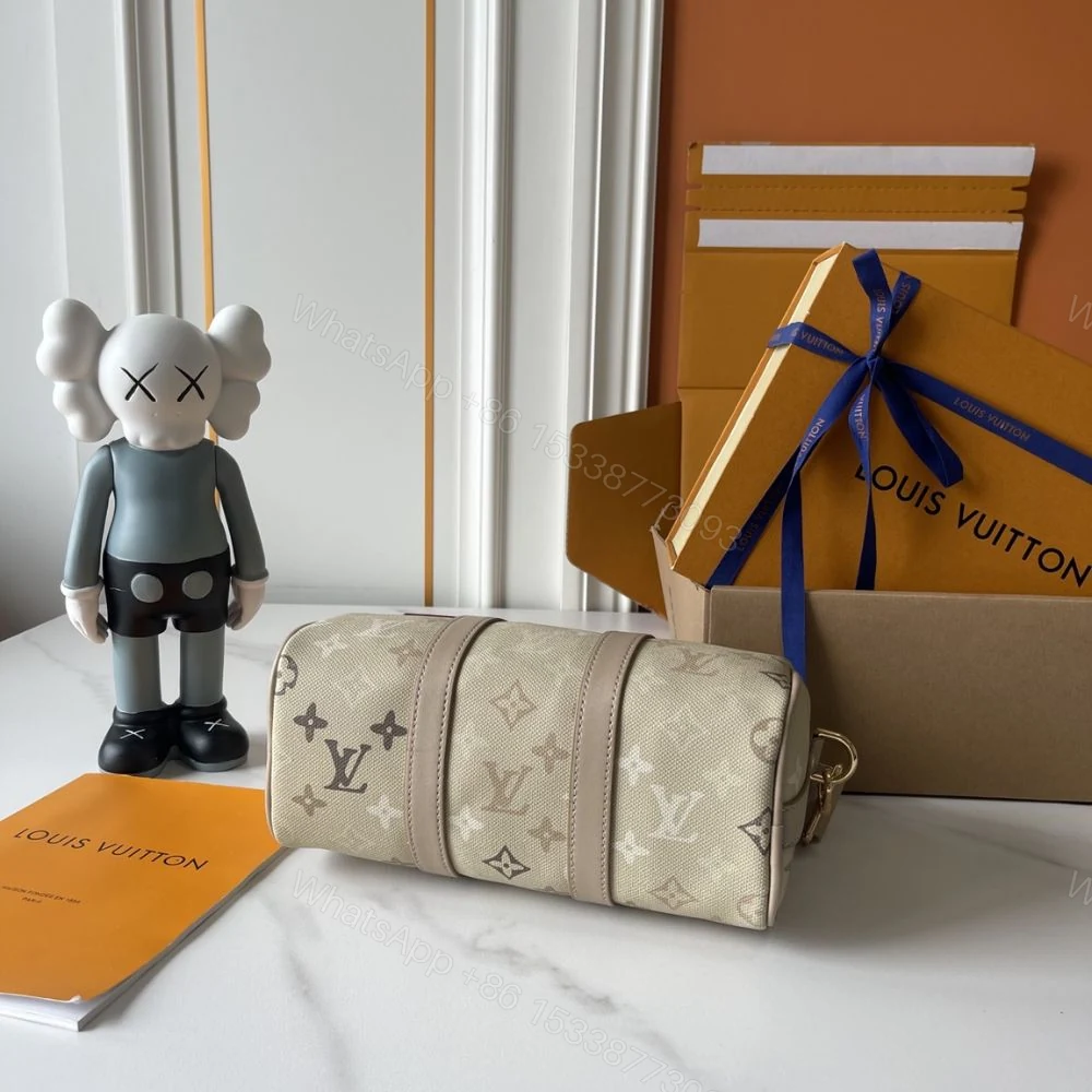 View 4 of Louis Vuitton Keepall Bandoulière 25 Sand Beige 25Cm M29272