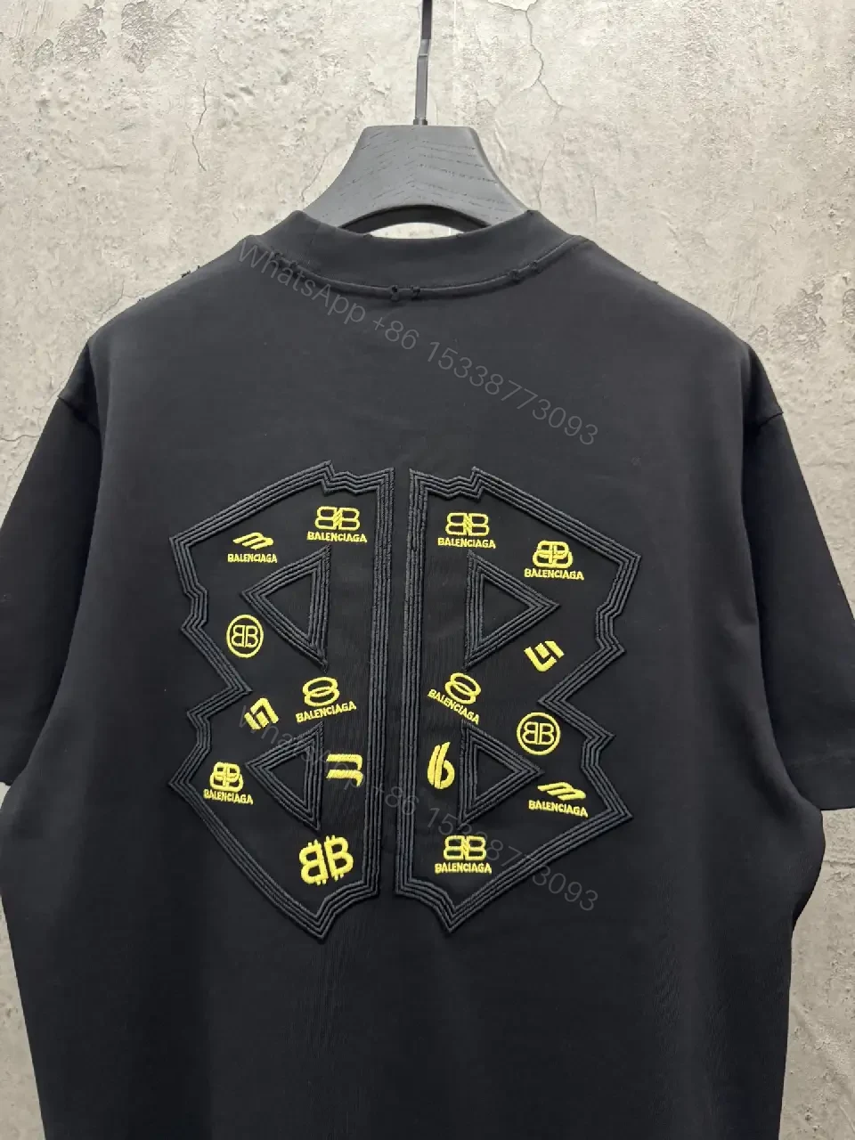 View 8 of Textured Logo Black Knit Tee – Oversized Luxury Streetwear