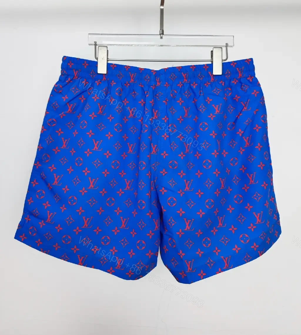 View 9 of Blue Louis Vuitton Monogram Swim Shorts with Red Drawstring