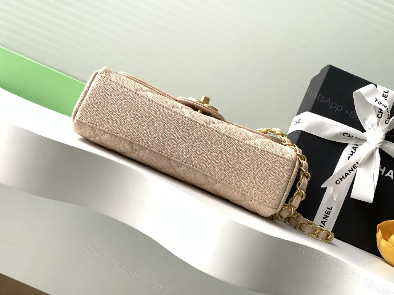 View 4 of Soft Beige Quilted Bag with Luxe Chain – Compact Luxury Tote