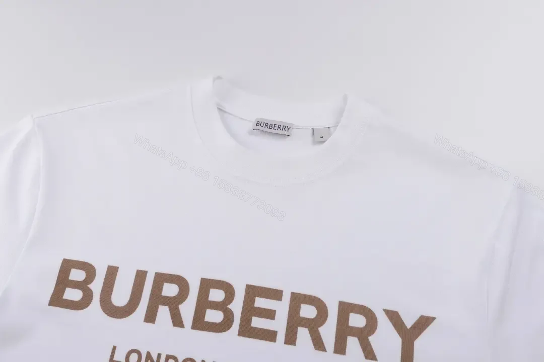 View 3 of Gold Logo White Tee — Minimalist Luxe Streetwear Tee
