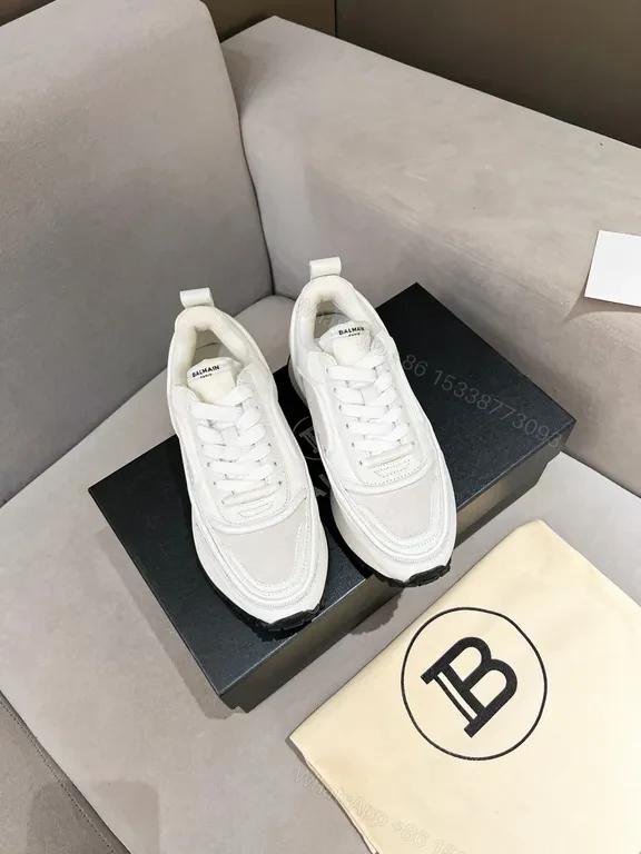 Chic White Balmain High-Top Sneakers: Luxe Comfort — view 1