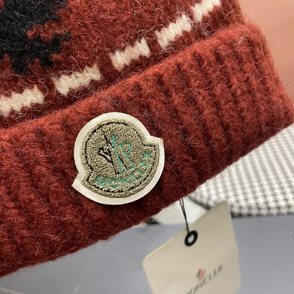 View 2 of Cozy Knit Beanie with Crest – Warm Patterned Style Beanie