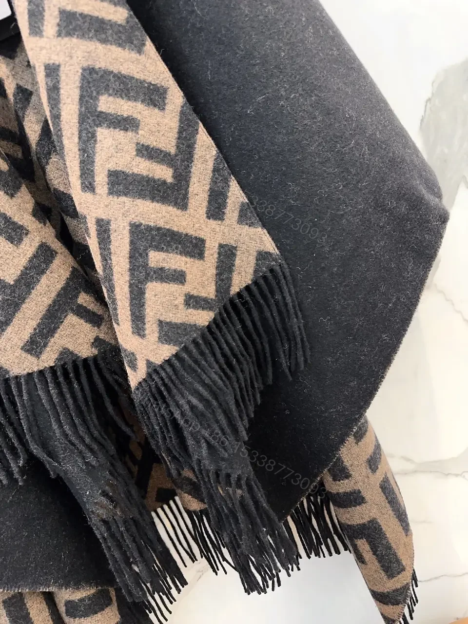 View 5 of Chic Monogram Wool Poncho with Fringe Details
