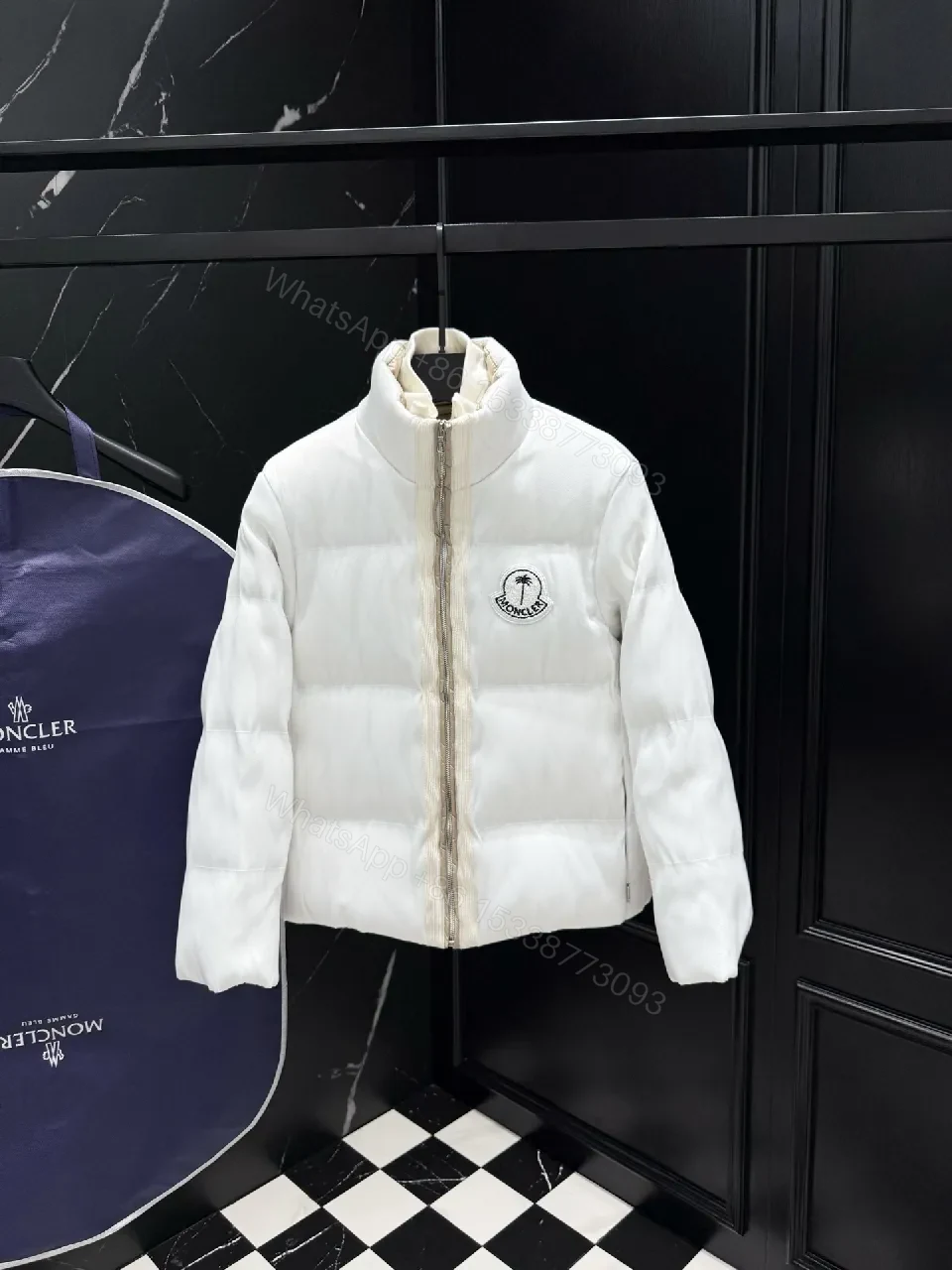 White Puffer Jacket with Iconic Emblem, Luxury Everyday Outerwear — view 1