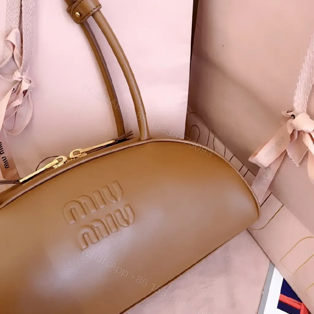 View 4 of Caramel Leather Dome Bag: Structured Luxury, Minimal Detailing