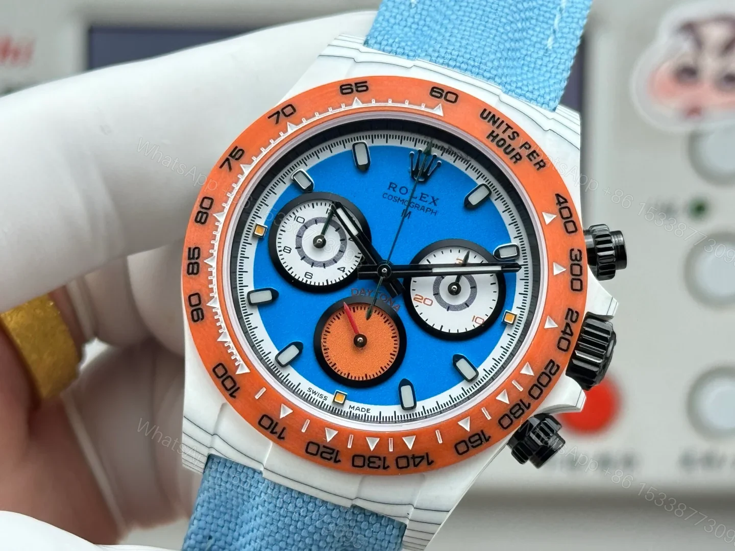 View 5 of Rolex Daytona Carbon Fiber Replica 40MM Exclusive Blue Dial Orange Bezel Fabric Strap R74 RG-ROLEX-DAYTONA
