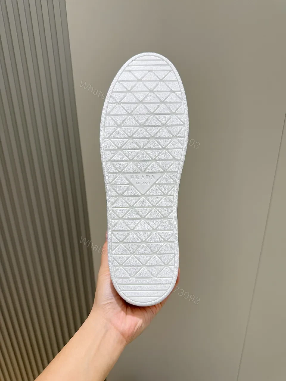 View 4 of Minimalist White Leather Low-Top Sneakers with Subtle Luxury Details