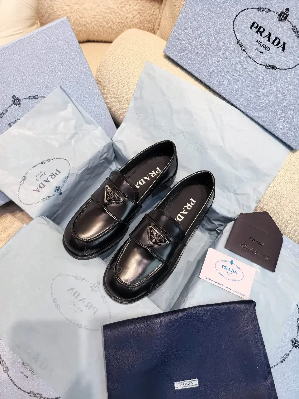 View 4 of Black Leather Prada Slippers with Logo Trim