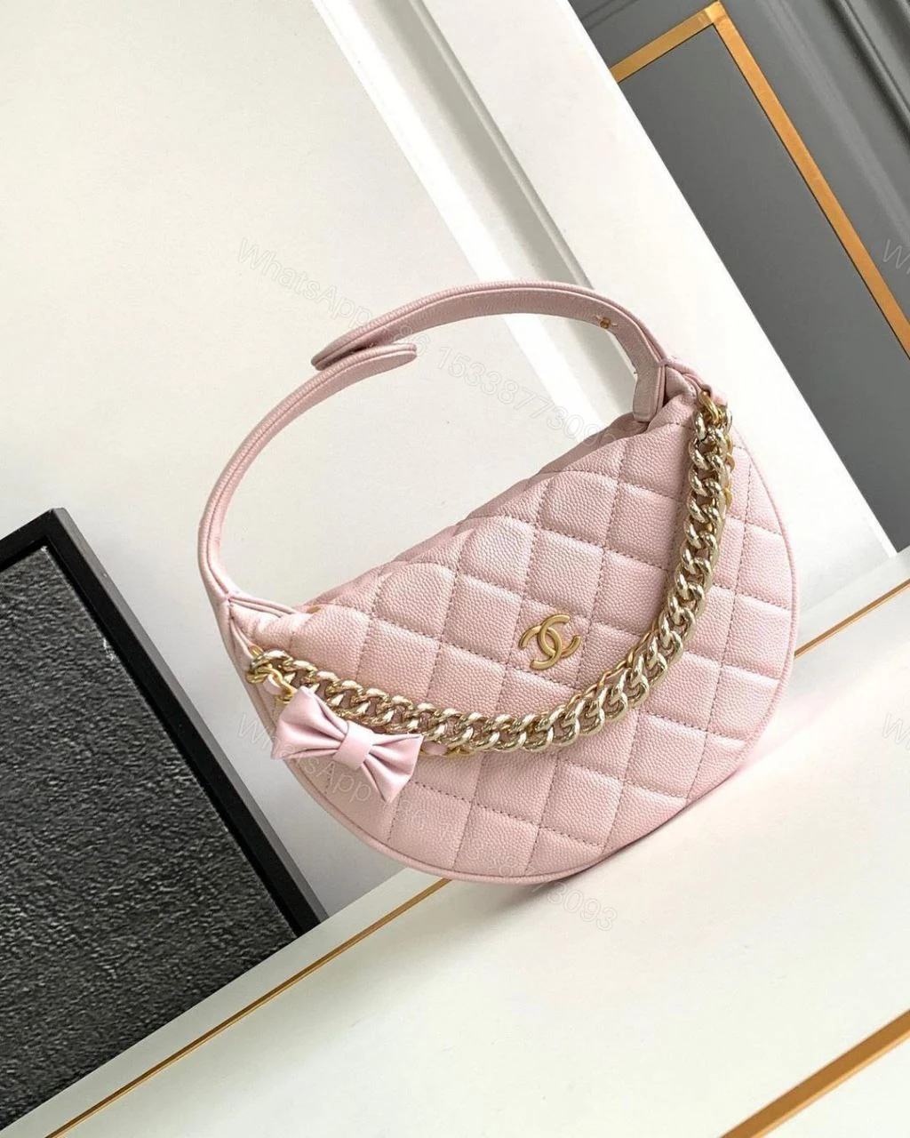 Chanel Shiny Caviar Quilted Bow Pouch Hobo — view 1