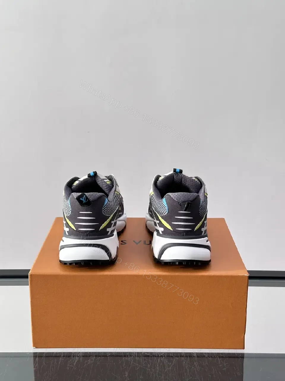 View 5 of Gray/Black Mesh Leather Sneaker with LV Accents, Sporty Chunky Style