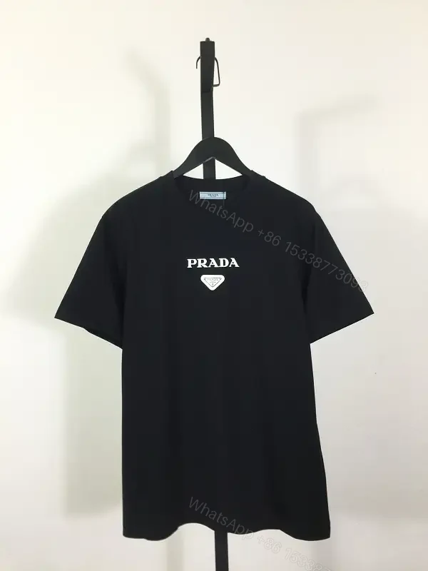 Minimalist Black Logo Tee: Premium Cotton Blend, Relaxed Fit — view 1