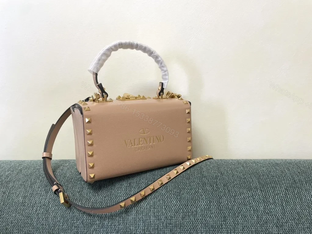 Chic Pink Rockstud Mini Bag: Compact Luxury Handbag — view 1