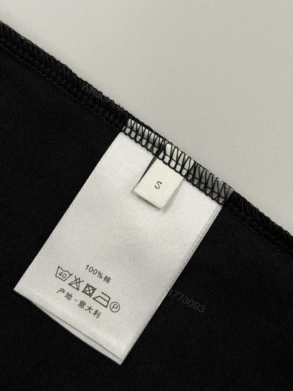 View 2 of Bold Black Cotton Tee: Subtle Luxe Dior Graphic