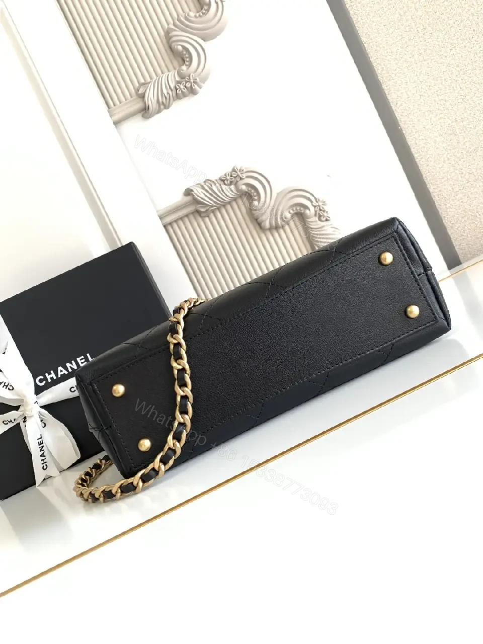 View 7 of Compact Quilted Black Leather Flap Bag with Chain Strap