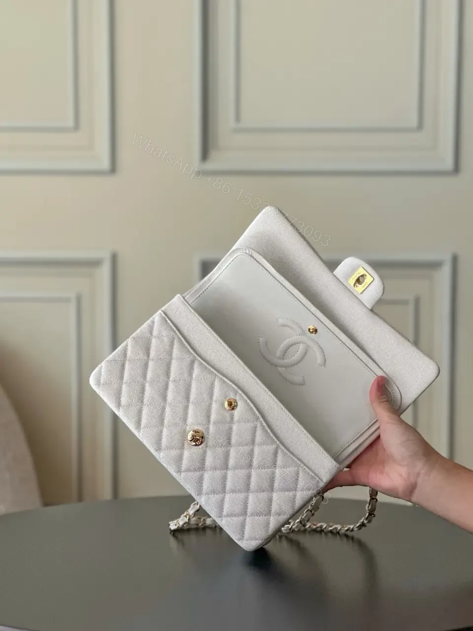 View 4 of Grey quilted leather chain-strap shoulder bag, luxury monogram-inspired pattern for everyday elegance