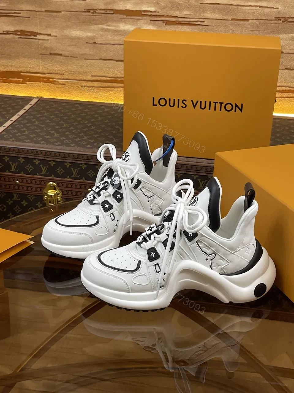 View 7 of Premium Leather High-Top Sneakers with LV Embellishments