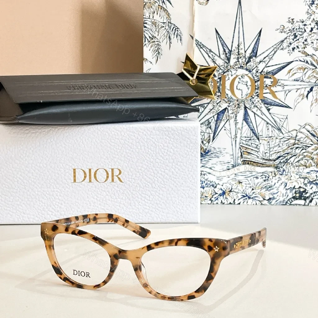 View 2 of Chic Tortoiseshell Cat-Eye Sunglasses with Star Detailing
