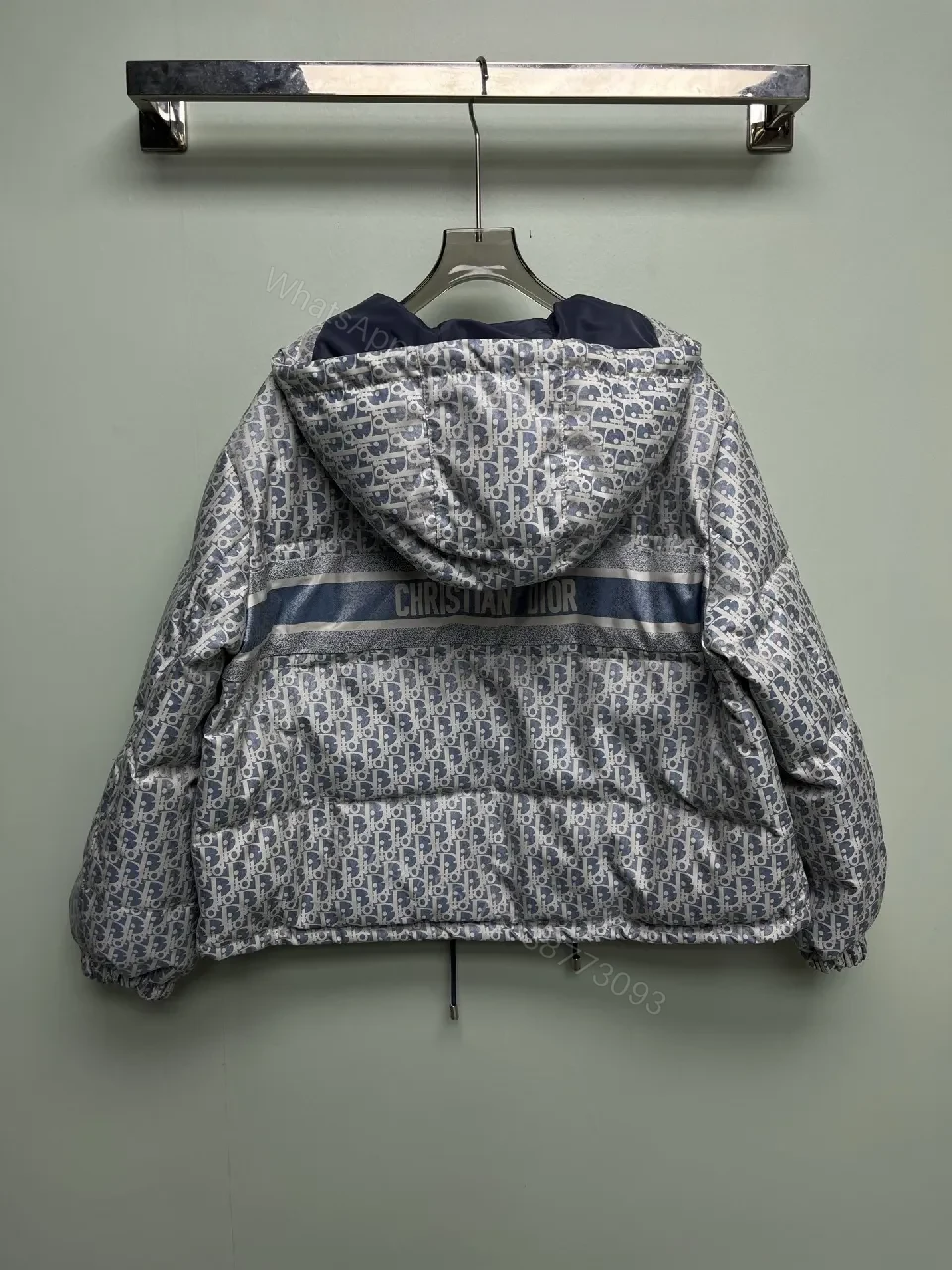 View 8 of Monochrome Puffer Jacket: Monogram Texture, Modern Warmth, Street-Ready Outerwear