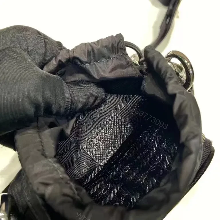 View 8 of Black Nylon Messenger Bag — Faux Prada Logo, Drawstring Closure, Adjustable Strap