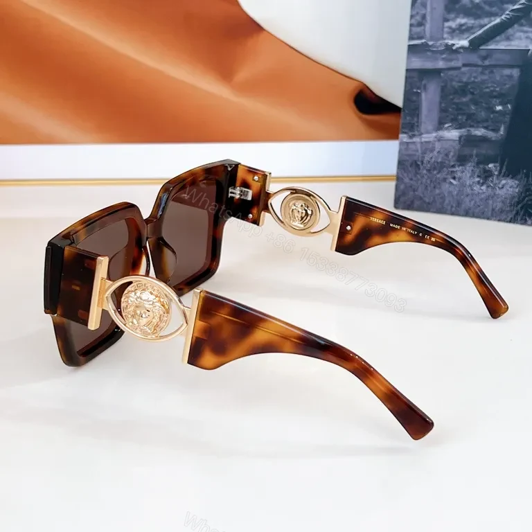 View 4 of Bold Oversized Sunglasses with Gold Accents: Statement Layer